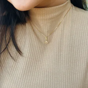 PINGENTE COROA. BANHADO A OURO 18K.