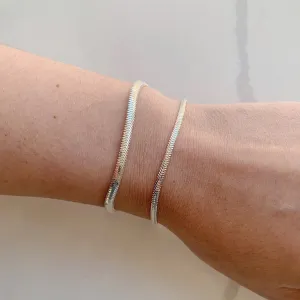 PULSEIRA SNAKE COM 2MM DE ESPESSURA. 18,5CM DE COMPRIMENTO. EM PRATA 925.