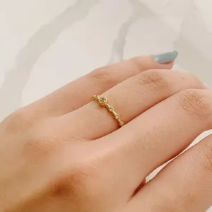 ANEL 7 PONTOS DE LUZ. BANHADO A OURO 18K.