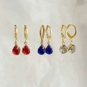 BRINCO ARGOLA GOTA . BANHADO A OURO 18K.