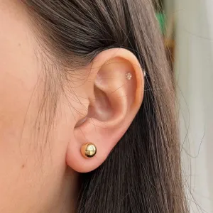 BRINCO BOLINHA LISA 6MM. BANHADO A OURO 18K.