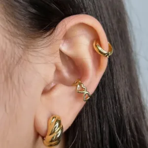 PIERCING CORAÇÕES VAZADO. BANHADO A OURO 18K.