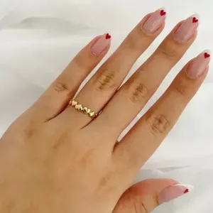 ANEL ALIANÇA CORAÇÕES OPOSTOS. BANHADO A OURO 18K.