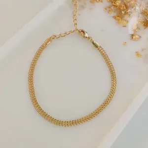 PULSEIRA MALHA CHINESA. 16CM DE COMPRIMENTO E 5CM DE REGULAGEM. BANHADO A OURO 18K.