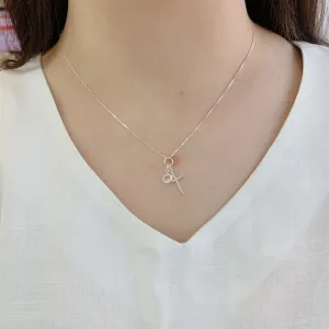 COLAR CRUZ PALITO COM PONTO DE LUZ. 45CM DE COMPRIMENTO. EM PRATA 925.