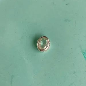 PINGENTE PONTO DE LUZ OVAL. 1CM DE ALTURA. EM PRATA 925