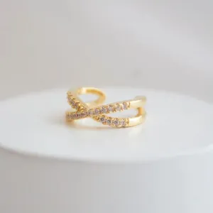 PIERCING FAKE X CRAVEJADO. BANHADO A OURO 18K.