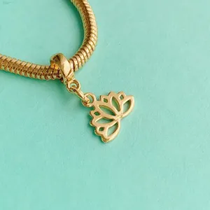 BERLOQUE FLOR DE LÓTUS VAZADA. BANHADO A OURO 18K.
