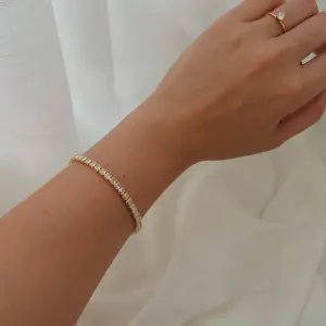 PULSEIRA RIVIERA 3MM. 17CM DE COMPRIMENTO E 5CM DE REGULAGEM. BANHADA A OURO 18K.