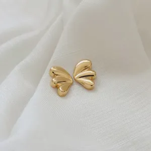 BRINCO ASA ARREDONDADA. BANHADO A OURO 18K.