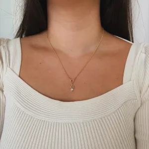COLAR FILHA (CORAÇÃO COM MENINA CRAVEJADA). 45CM DE COMPRIMENTO E 5CM DE REGULAGEM. BANHADO A OURO 18K.