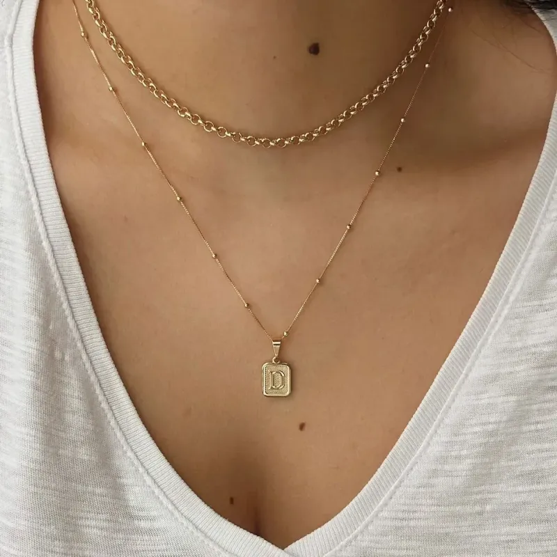 COLAR BOLINHAS. 45CM DE COMPRIMENTO. BANHADO A OURO 18K.