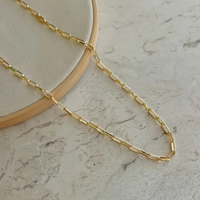 COLAR ELOS CARTIER. 70CM  DE COMPRIMENTO. BANHADO A OURO 18K.