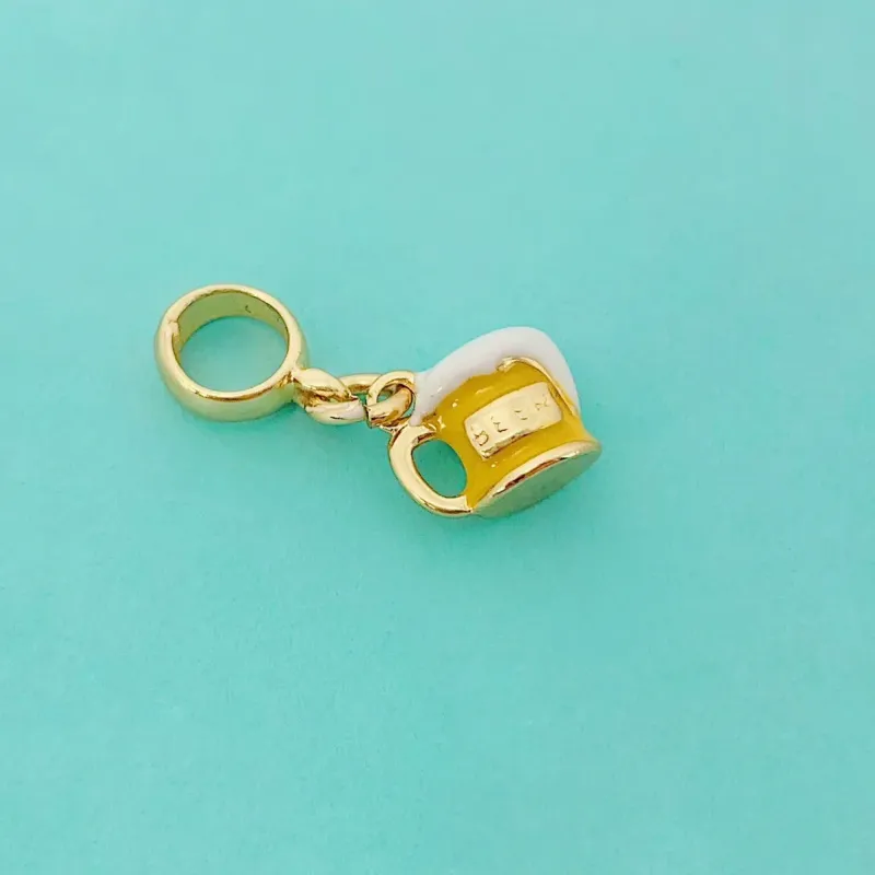 BERLOQUE BEER. BANHADO A OURO 18K.