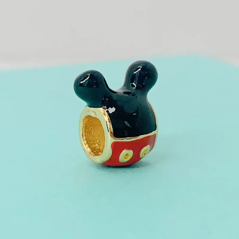 BERLOQUE MICKEY BANHADO A OURO 18K.