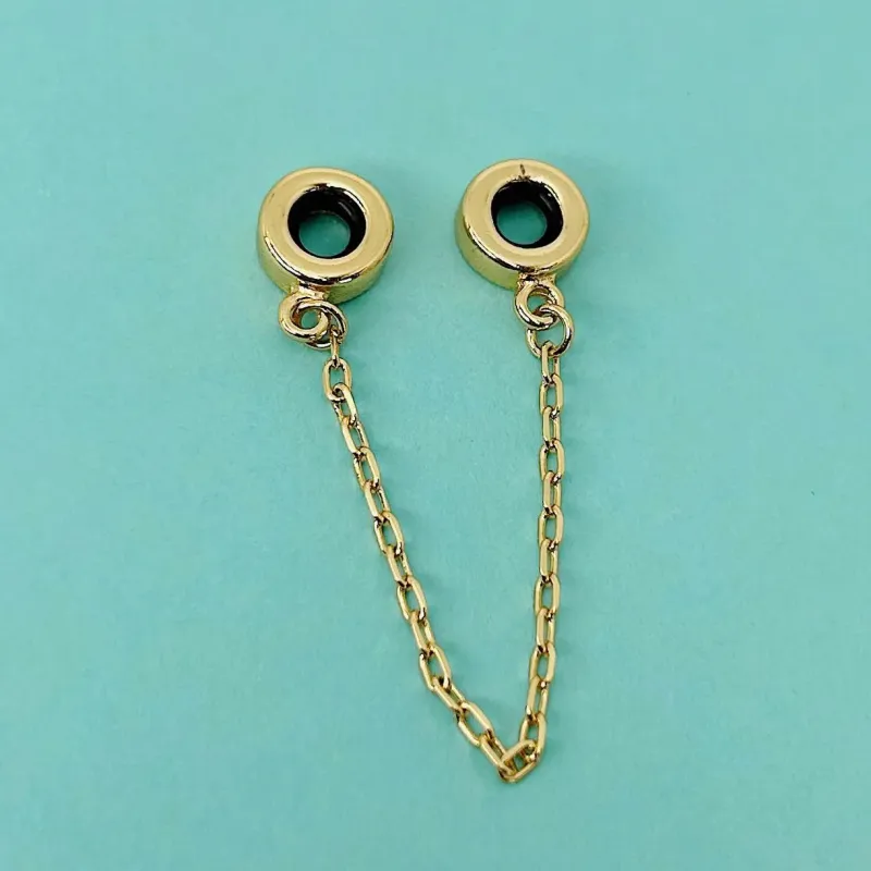 BERLOQUE PEGA LADRÃO TRADICIONAL. BANHADO A OURO 18K.