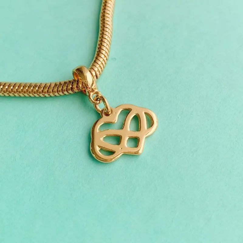 BERLOQUE CORAÇÃO E INFINITO. BANHADO A OURO 18K.