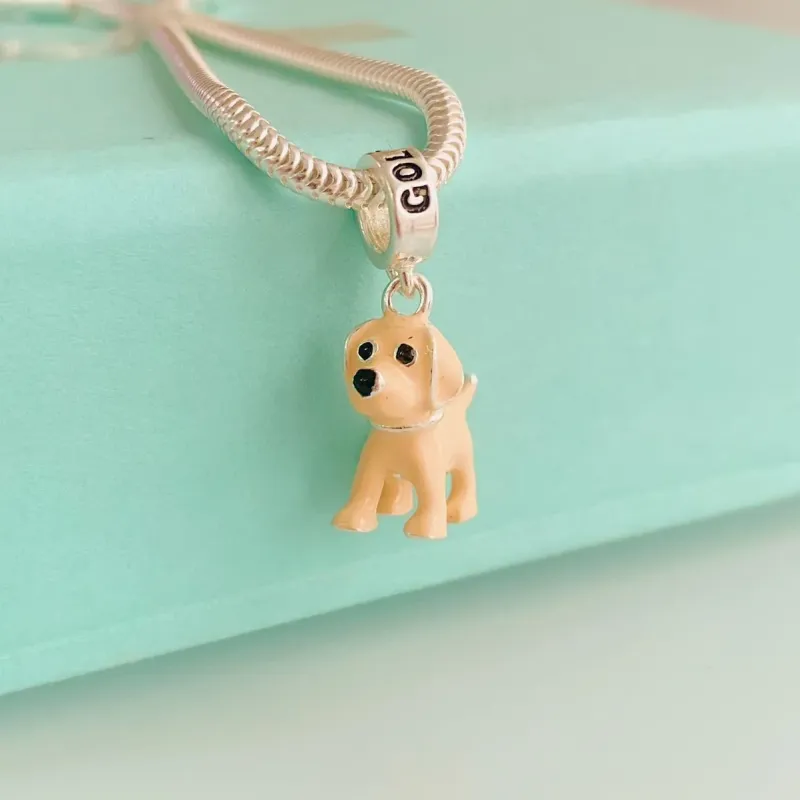 BERLOQUE GOLDEN RETRIVER. EM PRATA 925.