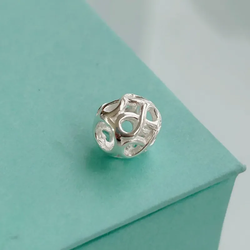 BERLOQUE SEPARADOR OVAL COM INFINITOS. EM PRATA 925.