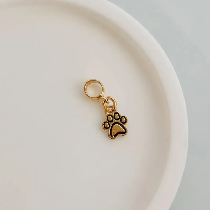 BERLOQUE PATINHA (PREENCHIDA). BANHADO A OURO 18K.