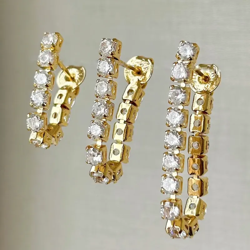 TRIO BRINCO RIVIERA CRISTAL. BANHADO A OURO 18K.