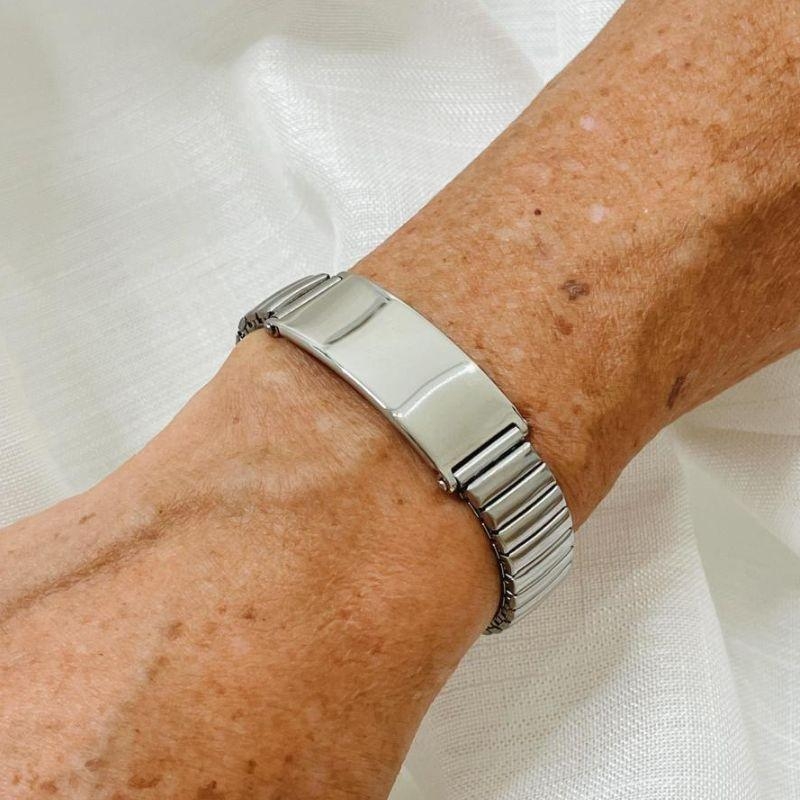 PULSEIRA MASCULINA INOX COM ELÁSTICO. 6CM DE DIÂMETRO.