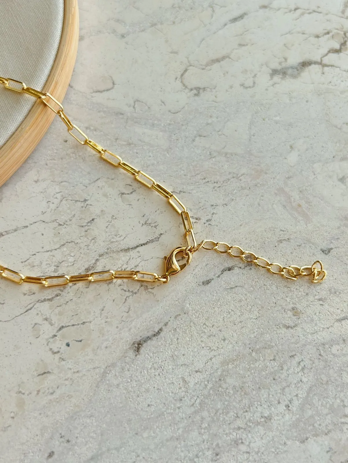 COLAR ELOS CARTIER. 70CM  DE COMPRIMENTO. BANHADO A OURO 18K.