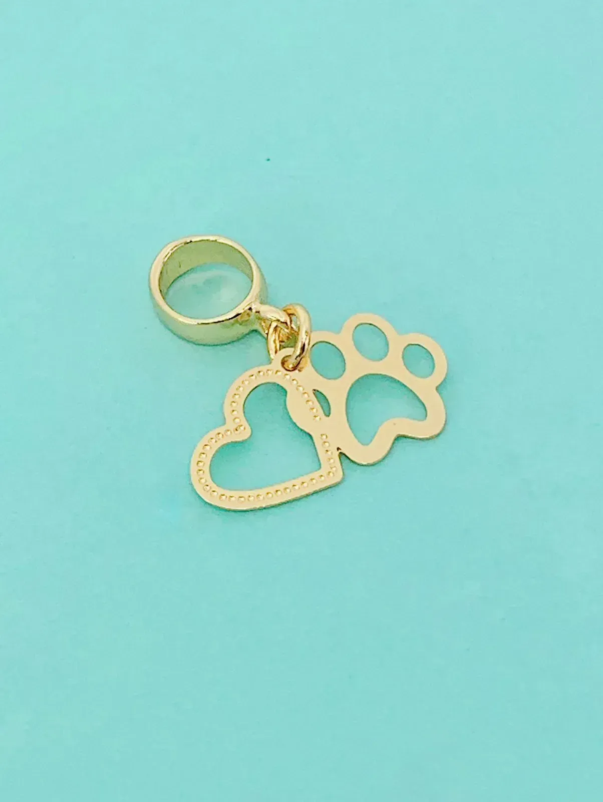 BERLOQUE AMOR PET. BANHADO A OURO 18K.