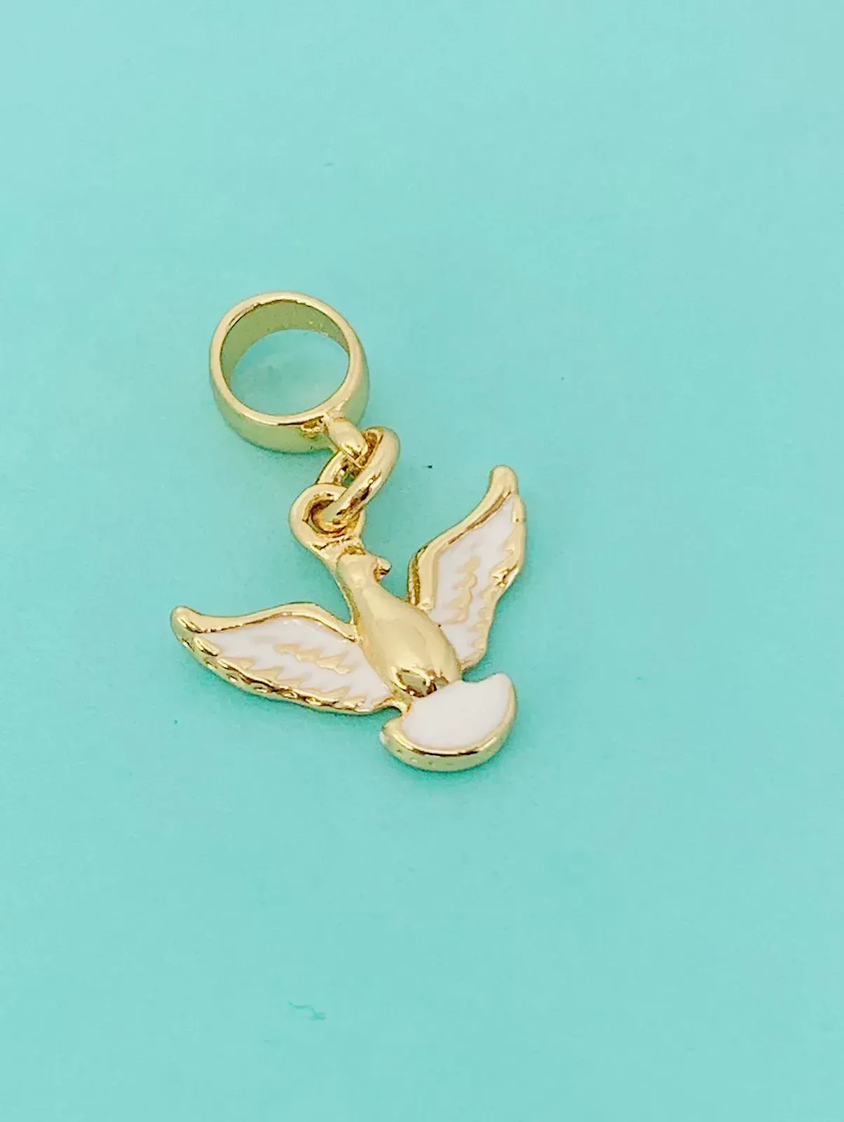 BERLOQUE ESPÍRITO SANTO. BANHADO A OURO 18K.