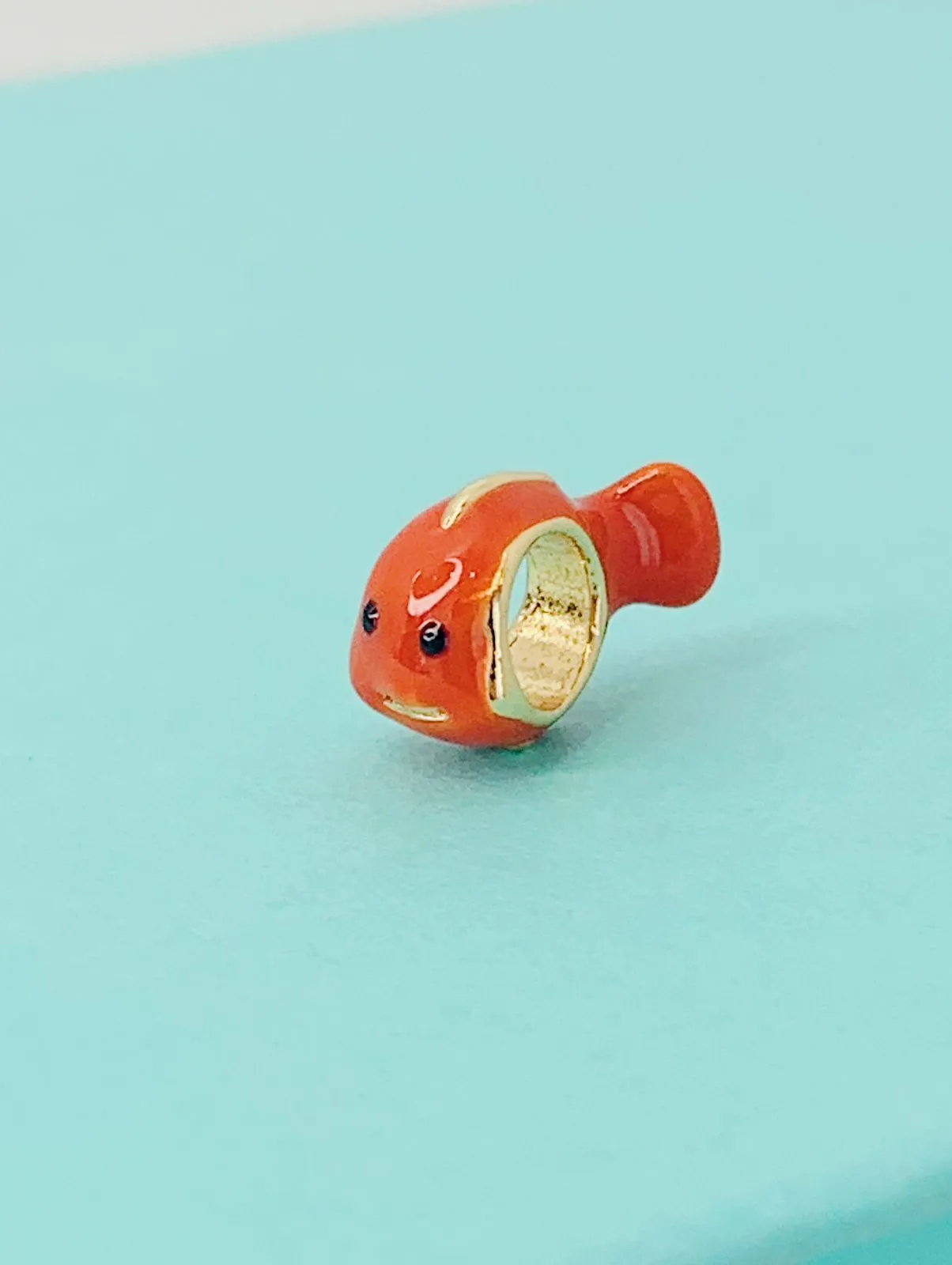 BERLOQUE NEMO. BANHADO A OURO 18K.