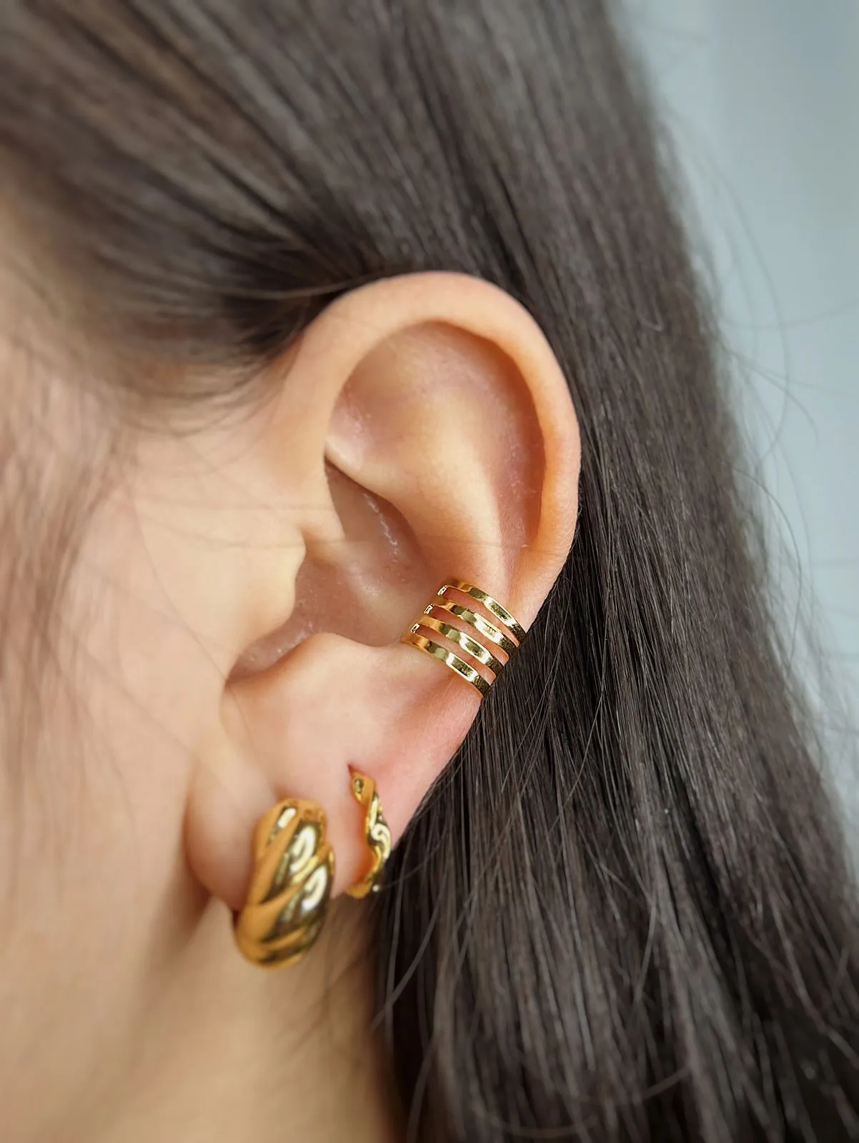 PIERCING 4 FIOS. BANHADO A OURO 18K.