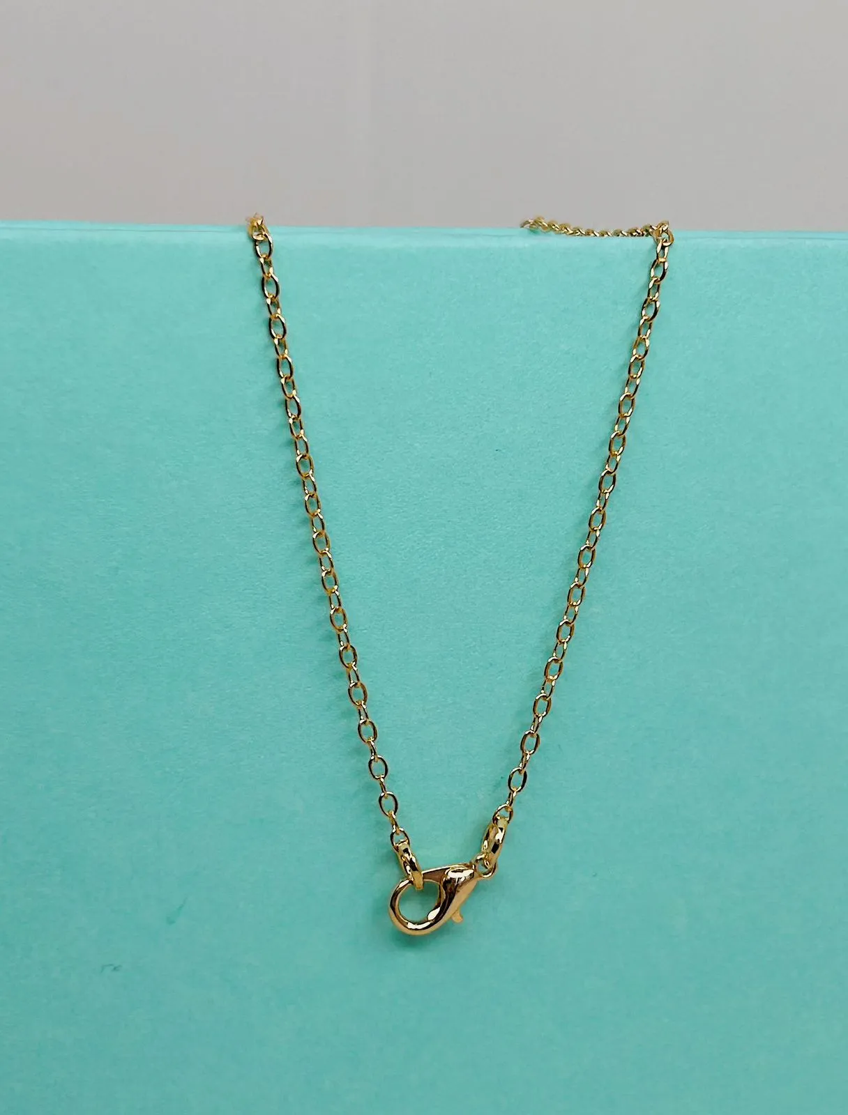 COLAR MINI ELOS PORTUGUÊS. 50CM DE COMPRIMENTO. BANHADO A OURO 18K.