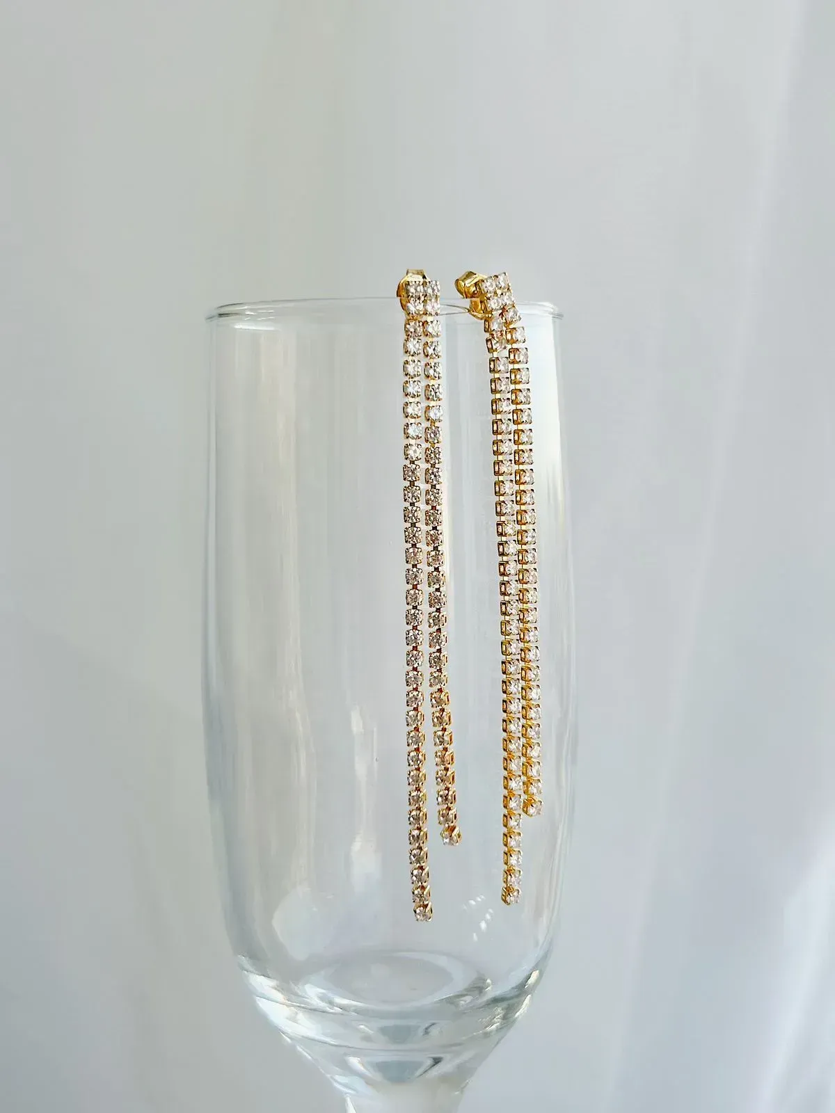 BRINCO RIVIERA DUPLO. BANHADO A OURO 18K.