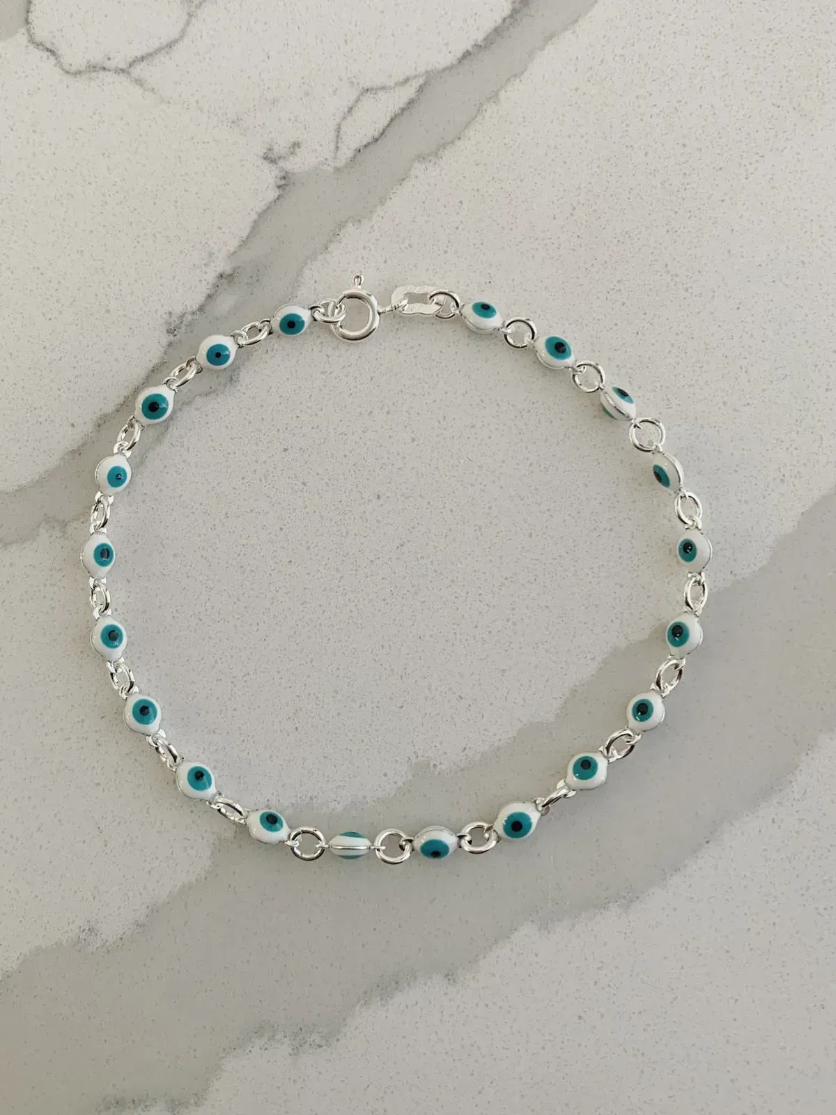 PULSEIRA 20 OLHOS GREGOS. 19CM DE COMPRIMENTO. EM PRATA 925.