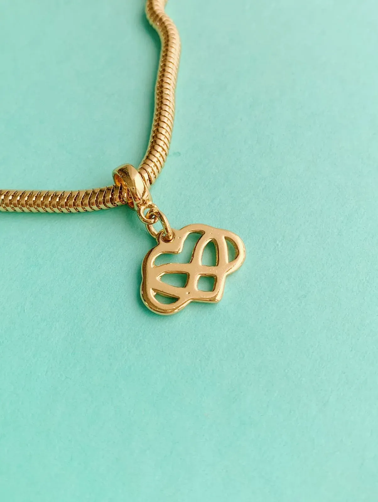 BERLOQUE CORAÇÃO E INFINITO. BANHADO A OURO 18K.