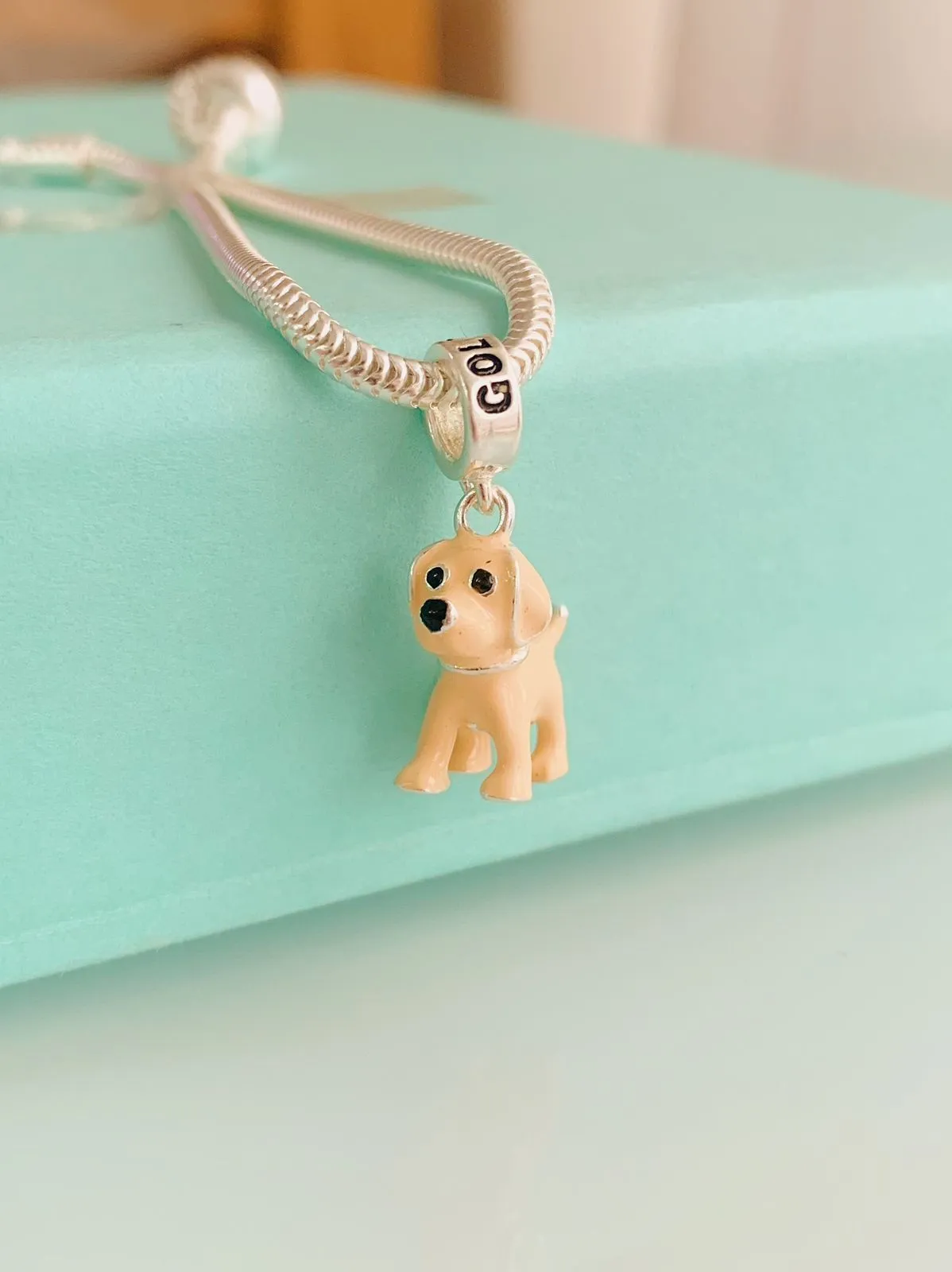 BERLOQUE GOLDEN RETRIVER. EM PRATA 925.