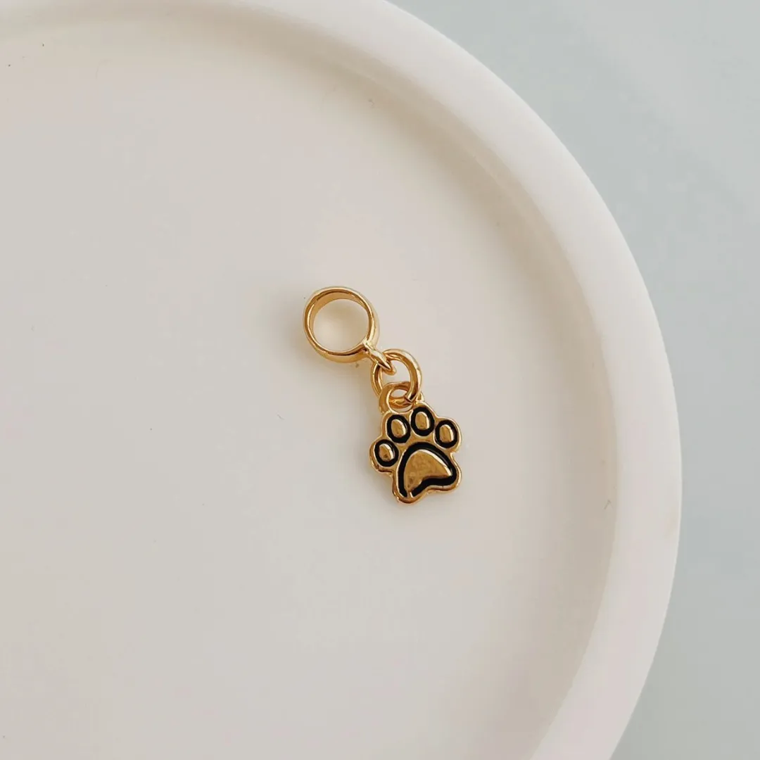 BERLOQUE PATINHA (PREENCHIDA). BANHADO A OURO 18K.