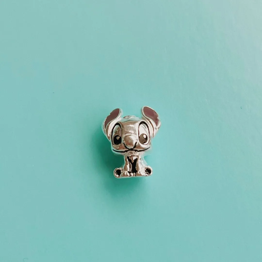 BERLOQUE SEPARADOR STITCH. EM PRATA 925.