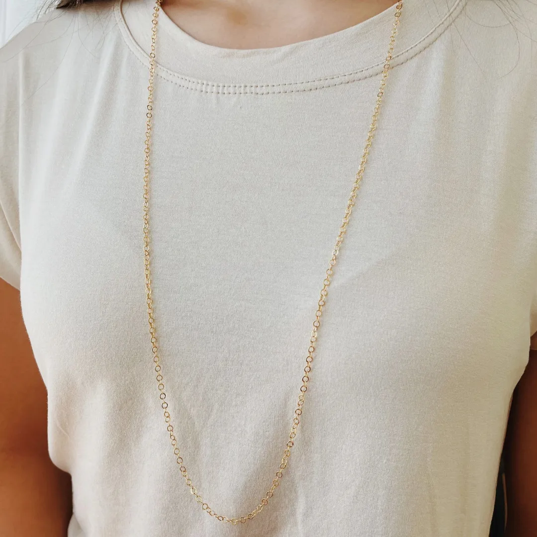 COLAR ELO REDONDO. 80CM DE COMPRIMENTO E 5CM DE REGULAGEM. BANHADO A OURO 18K.