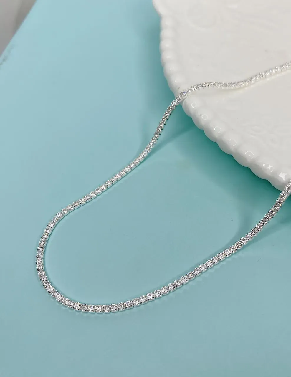 CHOKER RIVIERA COM 2MM DE ESPESSURA. 35CM DE COMPRIMENTO E 5CM DE REGULAGEM. EM PRATA 925.