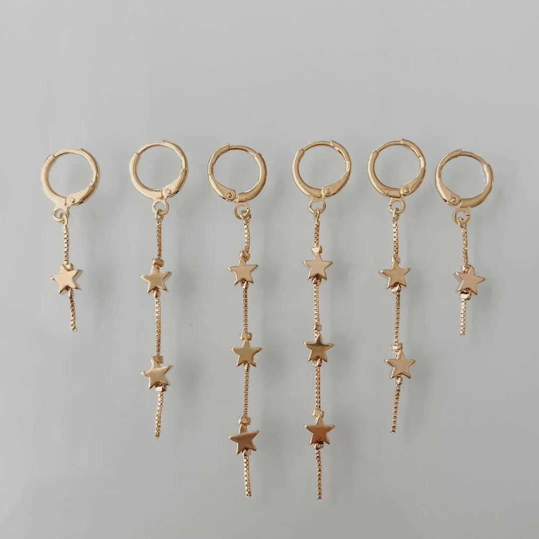 TRIO ARGOLAS COM ESTRELINHAS. BANHADO A OURO 18K.