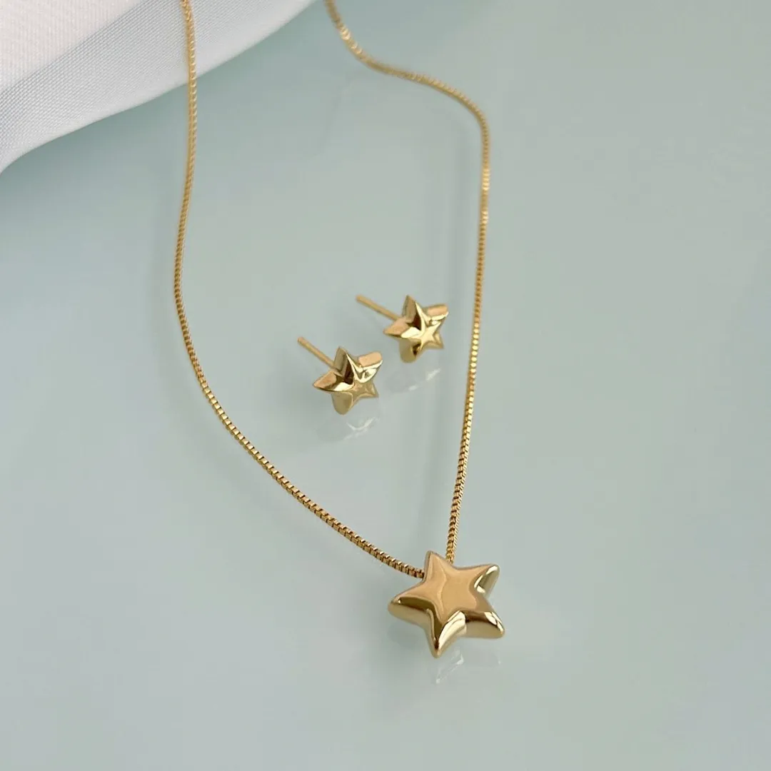 CONJUNTO ESTRELA. 45CM DE COMPRIMENTO E 5CM DE REGULAGEM. BANHADO A OURO 18K.