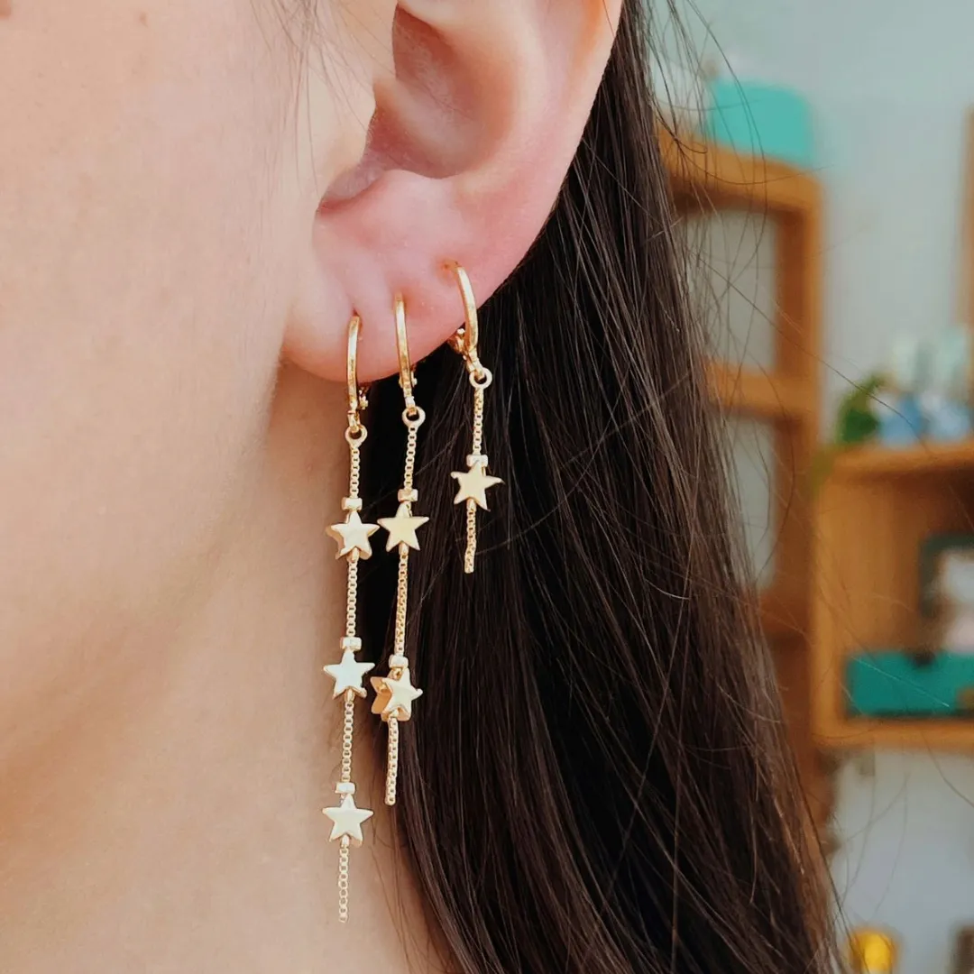 TRIO ARGOLAS COM ESTRELINHAS. BANHADO A OURO 18K.