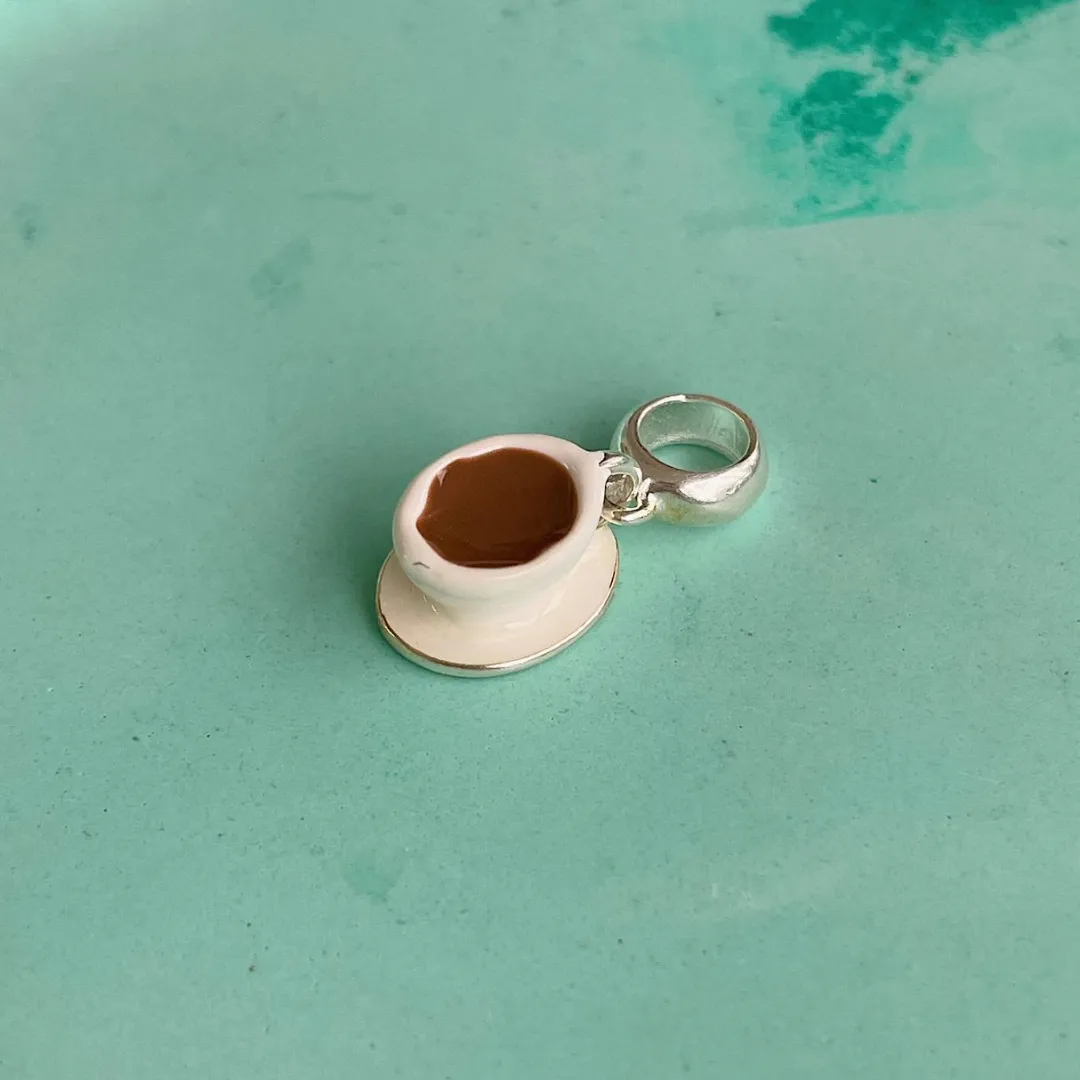 BERLOQUE CAFEZINHO. EM PRATA 925.
