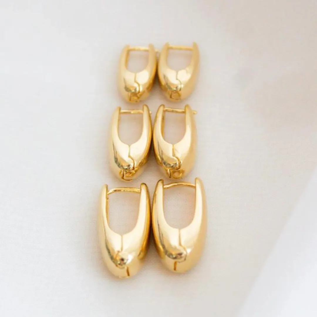 BRINCO ARGOLA GOTA LONGA. TAMANHO G. BANHADA A OURO 18K.