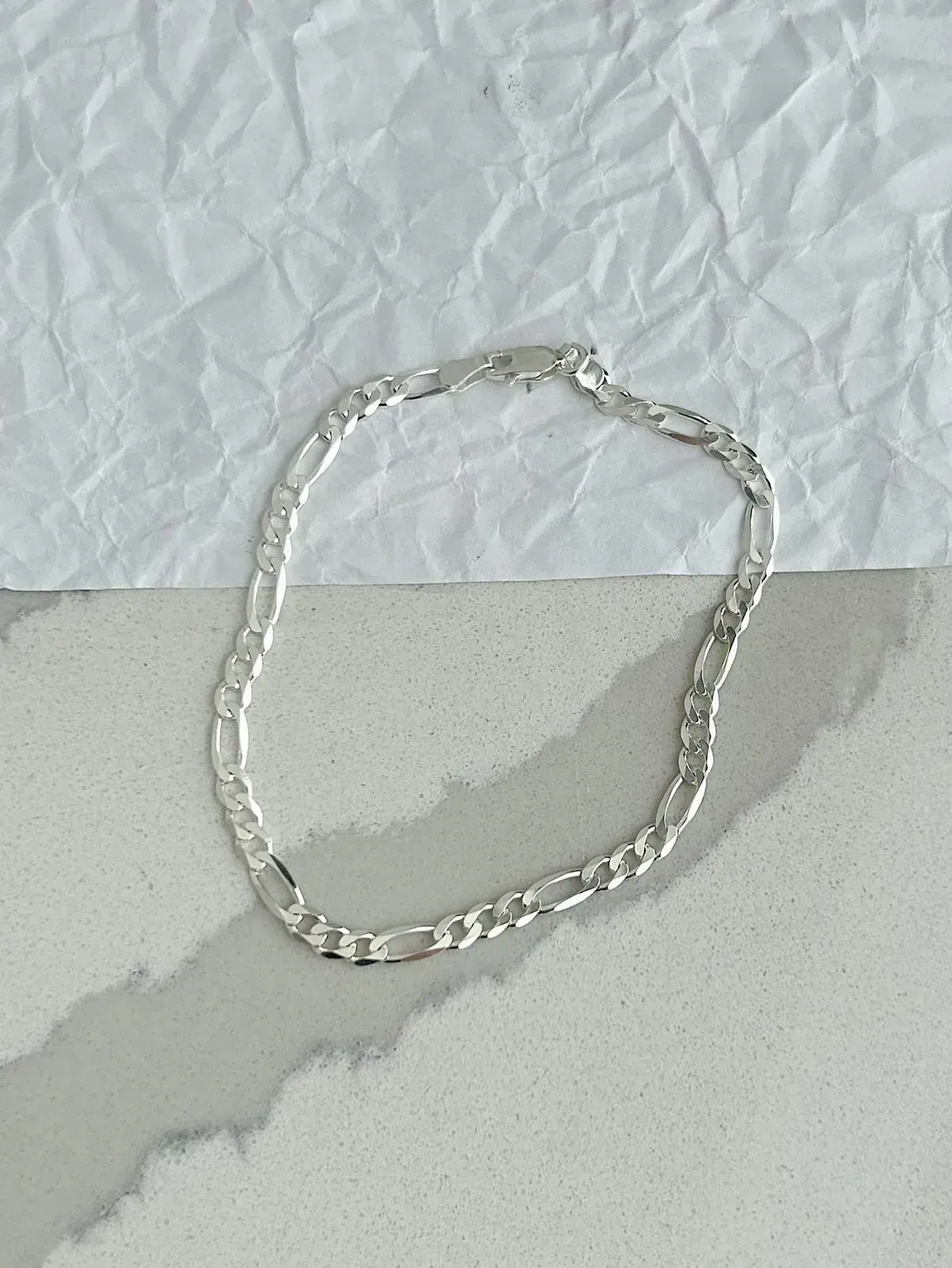 PULSEIRA MASCULINA 3X1. 4MM DE ESPESSURA. 21CM DE COMPRIMENTO. EM PRATA 925.