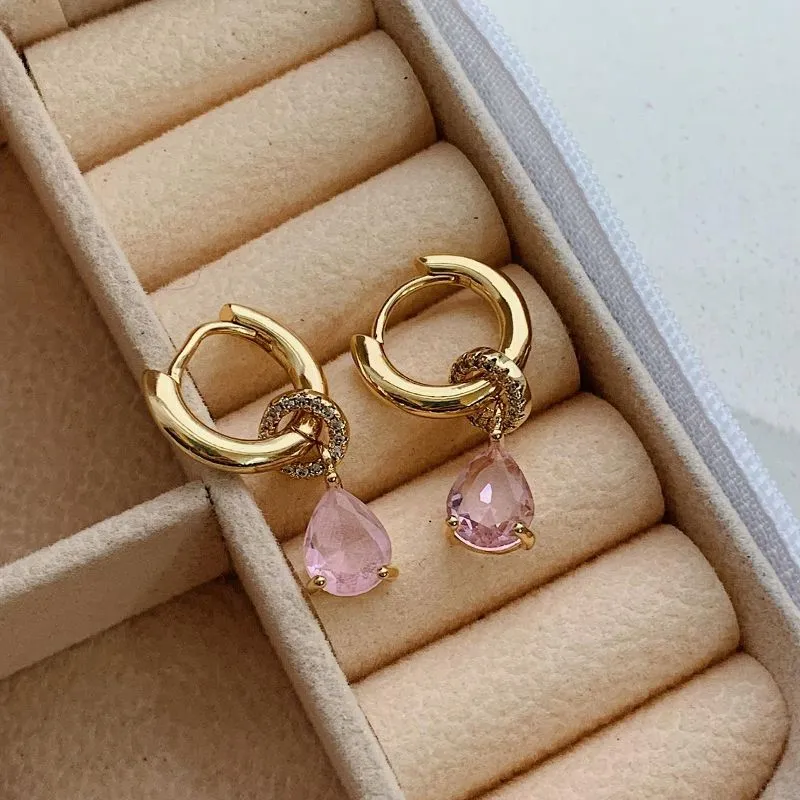 BRINCO 2 EM1. ARGOLA COM CIRCULO E ZIRCONIA GOTA ROSA. BANHADA A OURO 18K