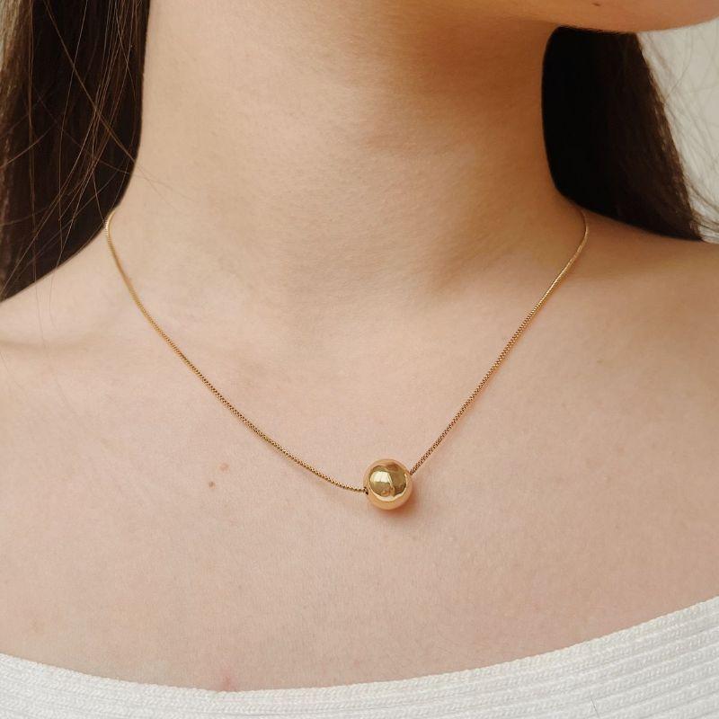 COLAR ESFERA 8MM. 40CM DE COMPRIMENTO E 5CM DE REGULAGEM. BANHADO A OURO 18K.