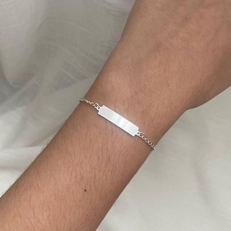 PULSEIRA INFANTIL PLAQUINHA. 14,5CM DE COMPRIMENTO E 2CM DE REGULAGEM. EM PRATA 925.