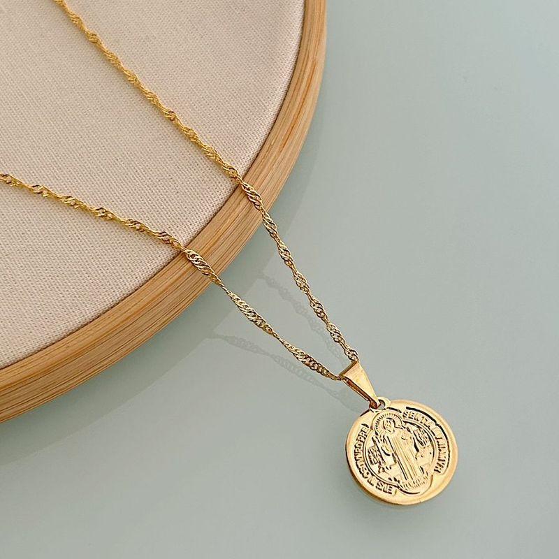 COLAR COM MEDALHA DE SÃO BENTO. 45CM DE COMPRIMENTO. BANHADO A  OURO 18K.